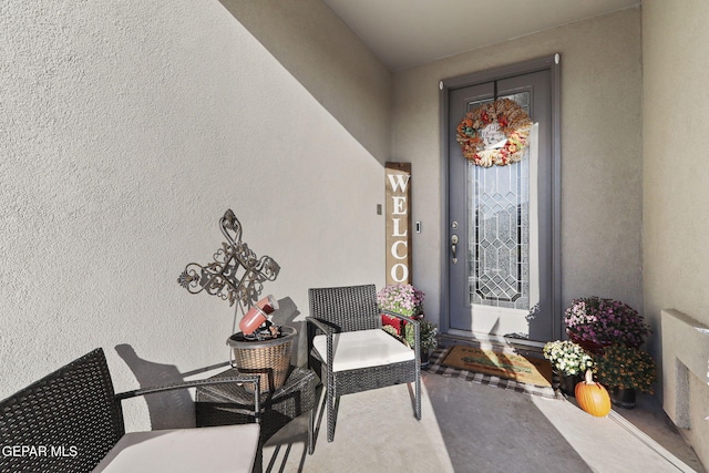 2528 Mike Price Dr, El Paso, TX 79938 - doorway to property featuring stucco siding and a porch