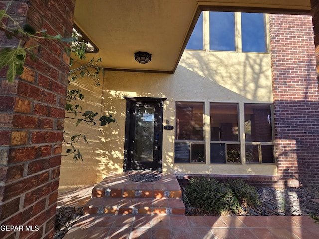 441 Irondale Dr, El Paso, TX 79912 - property entrance featuring stucco siding and brick siding