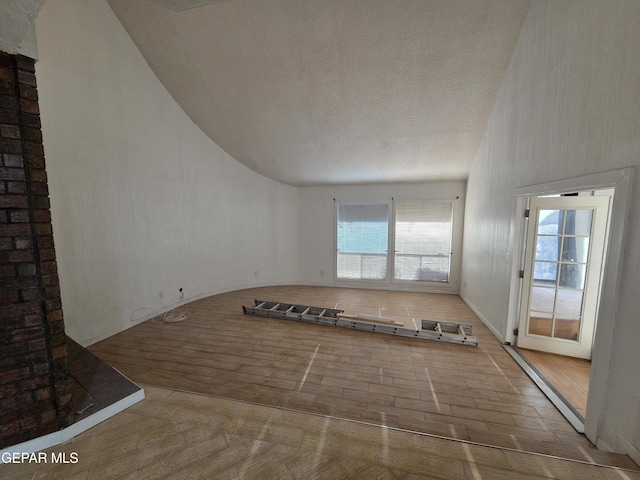 441 Irondale Dr, El Paso, TX 79912 - spare room featuring wood finished floors and a textured ceiling