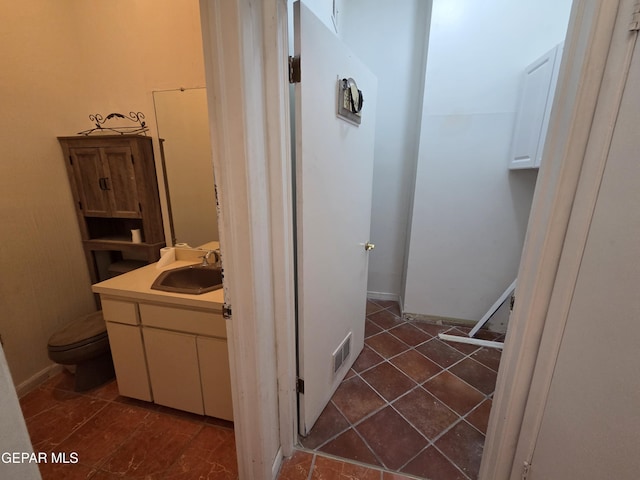 441 Irondale Dr, El Paso, TX 79912 - bathroom with vanity, toilet, and tile patterned flooring