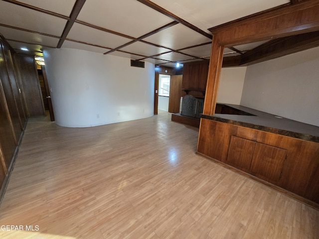 441 Irondale Dr, El Paso, TX 79912 - unfurnished living room with a large fireplace and light wood-type flooring