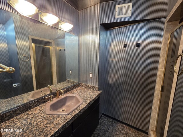 441 Irondale Dr, El Paso, TX 79912 - bathroom with vanity and a shower stall