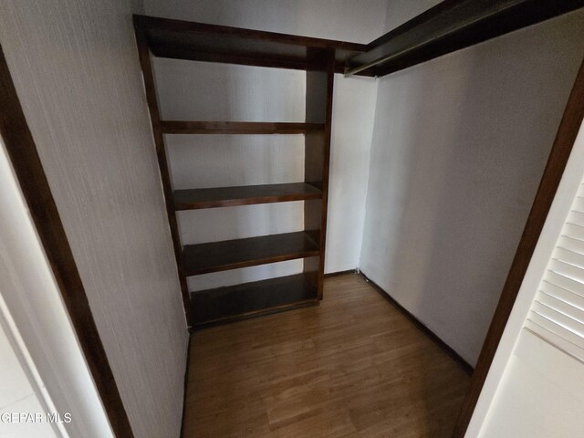 441 Irondale Dr, El Paso, TX 79912 - walk in closet featuring wood finished floors