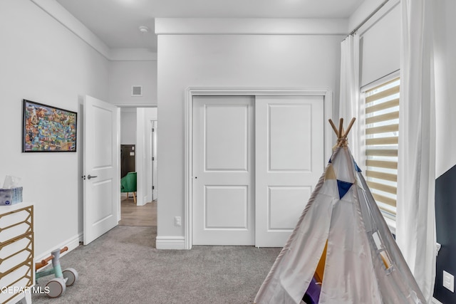 13107 Kington Ave, El Paso, TX 79928 - game room with light carpet and baseboards