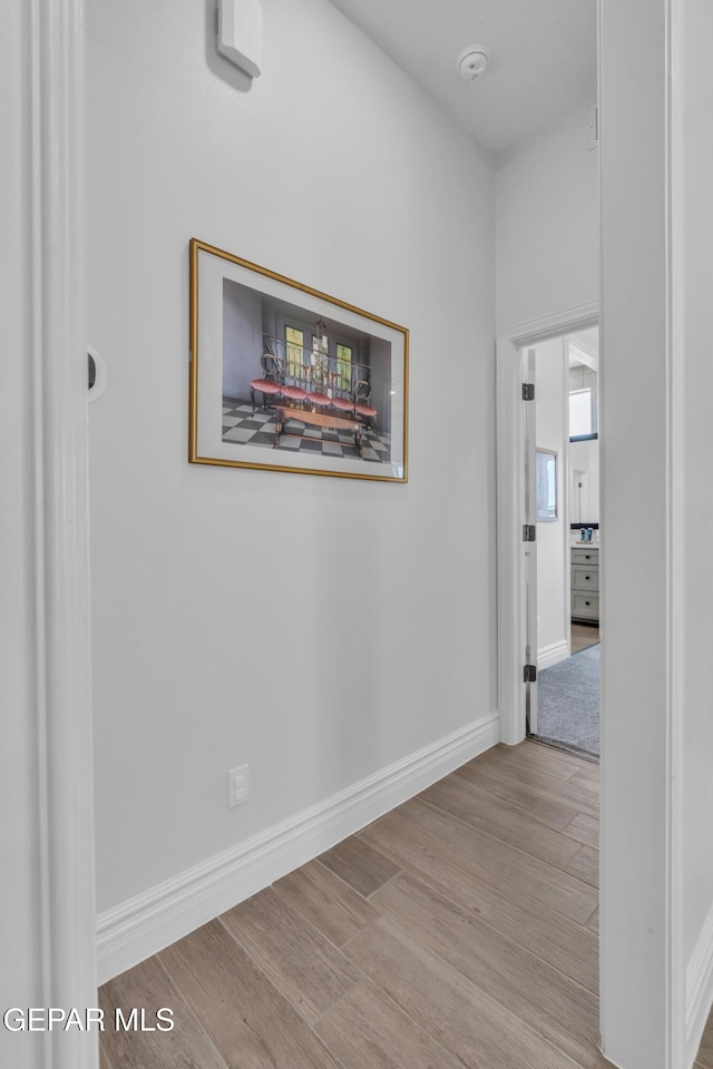 13107 Kington Ave, El Paso, TX 79928 - hall featuring wood finished floors and baseboards