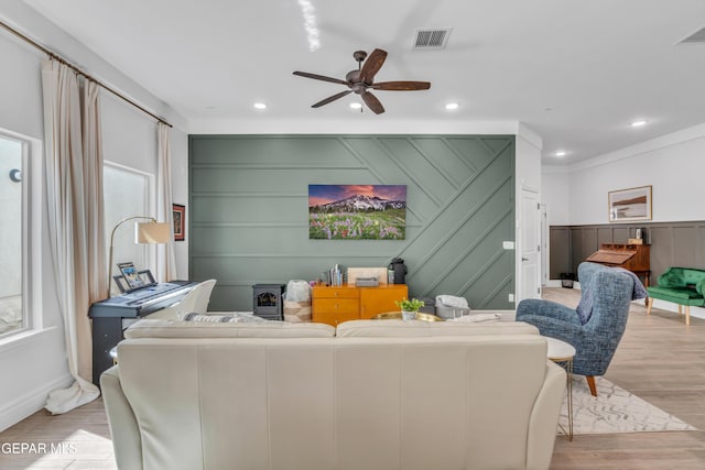 13107 Kington Ave, El Paso, TX 79928 - living area featuring a ceiling fan, wood finished floors, recessed lighting, and a decorative wall