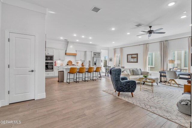 13107 Kington Ave, El Paso, TX 79928 - living area featuring ceiling fan, recessed lighting, and light wood finished floors