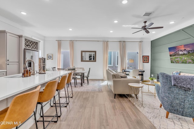 13107 Kington Ave, El Paso, TX 79928 - living room featuring light wood-style floors, recessed lighting, ceiling fan, and baseboards