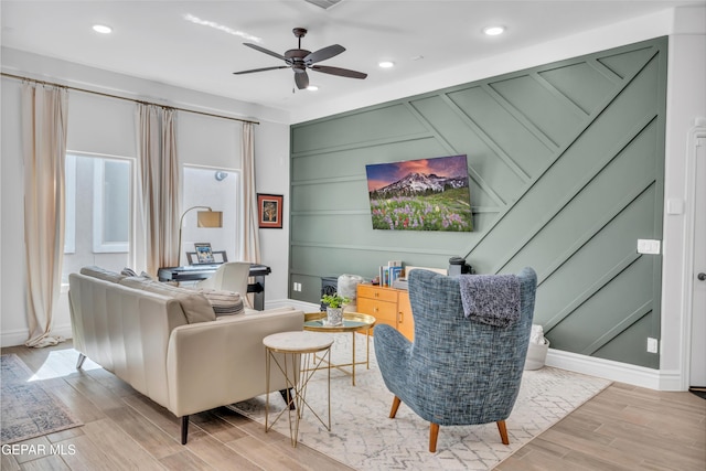 13107 Kington Ave, El Paso, TX 79928 - living area featuring wood finished floors, a ceiling fan, recessed lighting, a decorative wall, and baseboards
