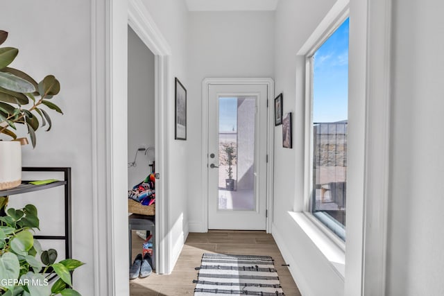 13107 Kington Ave, El Paso, TX 79928 - entryway with wood finished floors and baseboards
