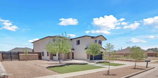11316 Menlo Ave, El Paso, TX 79936 - view of front of house with stucco siding and stone siding