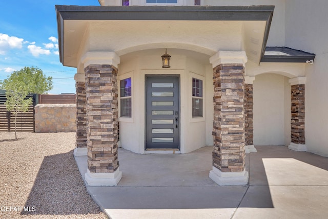 11316 Menlo Ave, El Paso, TX 79936 - doorway to property with stucco siding