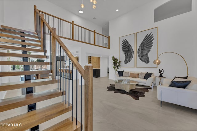11316 Menlo Ave, El Paso, TX 79936 - staircase with a towering ceiling and recessed lighting