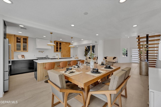 11316 Menlo Ave, El Paso, TX 79936 - dining area featuring recessed lighting and a textured ceiling