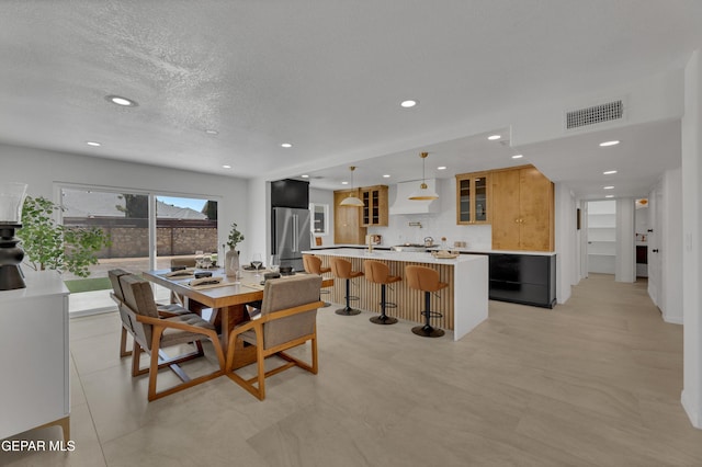 11316 Menlo Ave, El Paso, TX 79936 - dining room featuring recessed lighting and a textured ceiling