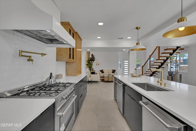 11316 Menlo Ave, El Paso, TX 79936 - kitchen featuring appliances with stainless steel finishes, custom exhaust hood, a sink, light countertops, and recessed lighting