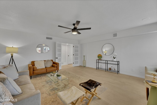11316 Menlo Ave, El Paso, TX 79936 - living area with ceiling fan, carpet, and baseboards
