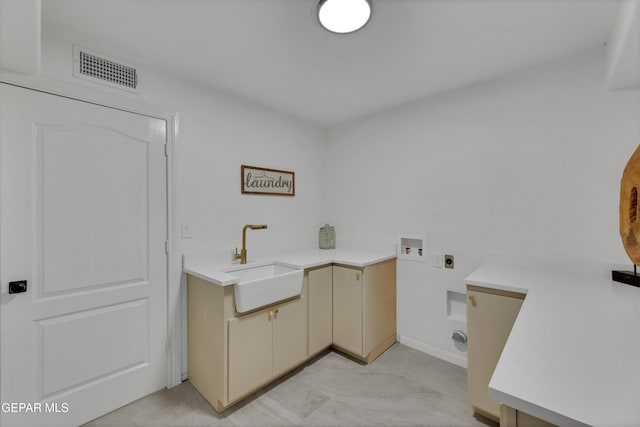 11316 Menlo Ave, El Paso, TX 79936 - laundry area with hookup for an electric dryer, hookup for a washing machine, and cabinet space
