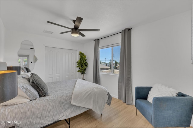 11316 Menlo Ave, El Paso, TX 79936 - bedroom with light wood-type flooring, a closet, and ceiling fan