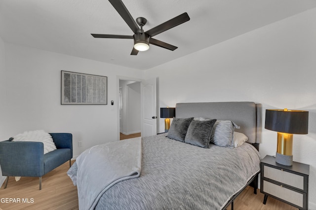 11316 Menlo Ave, El Paso, TX 79936 - bedroom with wood finished floors and ceiling fan