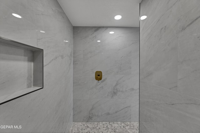 11316 Menlo Ave, El Paso, TX 79936 - bathroom with a tile shower and recessed lighting
