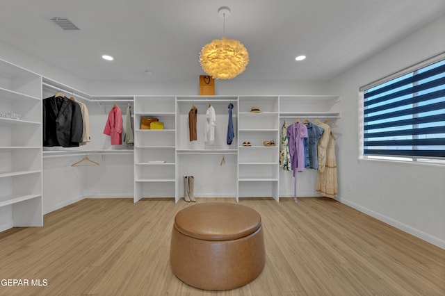 11316 Menlo Ave, El Paso, TX 79936 - spacious closet with wood finished floors