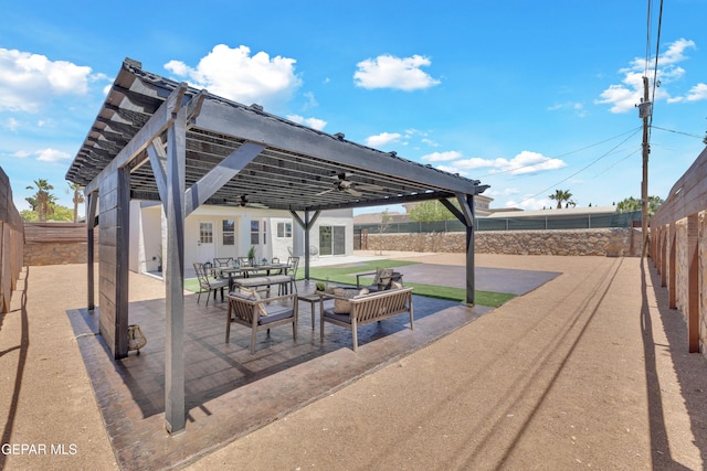 11316 Menlo Ave, El Paso, TX 79936 - fenced backyard with ceiling fan and a patio area