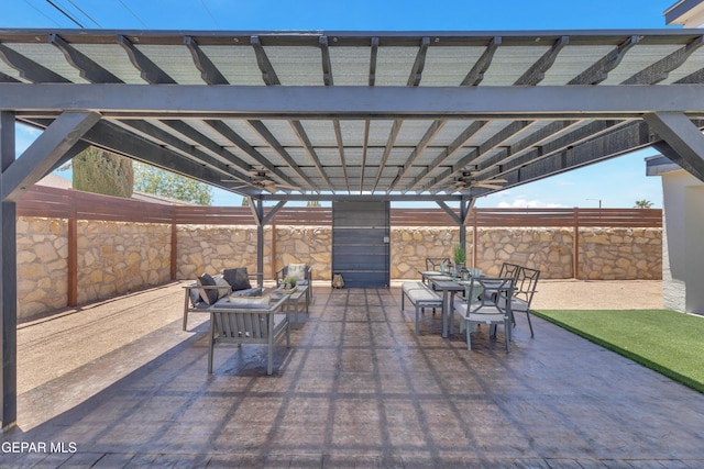 11316 Menlo Ave, El Paso, TX 79936 - fenced backyard featuring outdoor dining space, a pergola, a ceiling fan, and a patio area