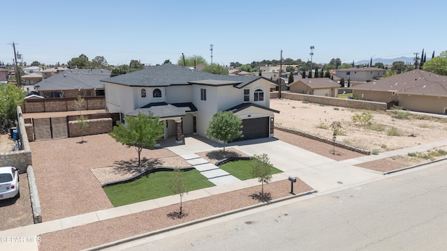 11316 Menlo Ave, El Paso, TX 79936 - view of front of property with concrete driveway, a residential view, a shingled roof, and an attached garage