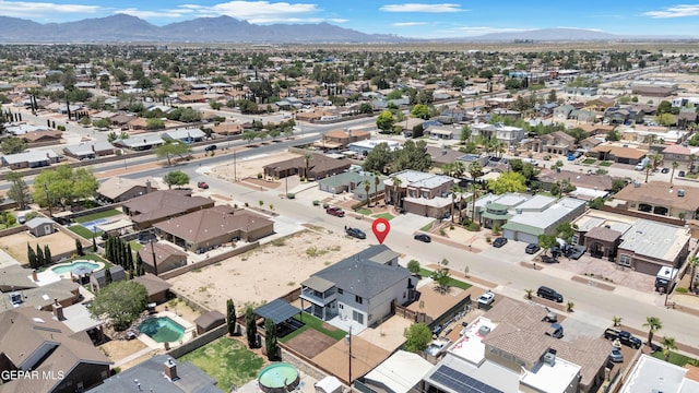 11316 Menlo Ave, El Paso, TX 79936 - aerial view of property and surrounding area featuring a mountain backdrop and nearby suburban area