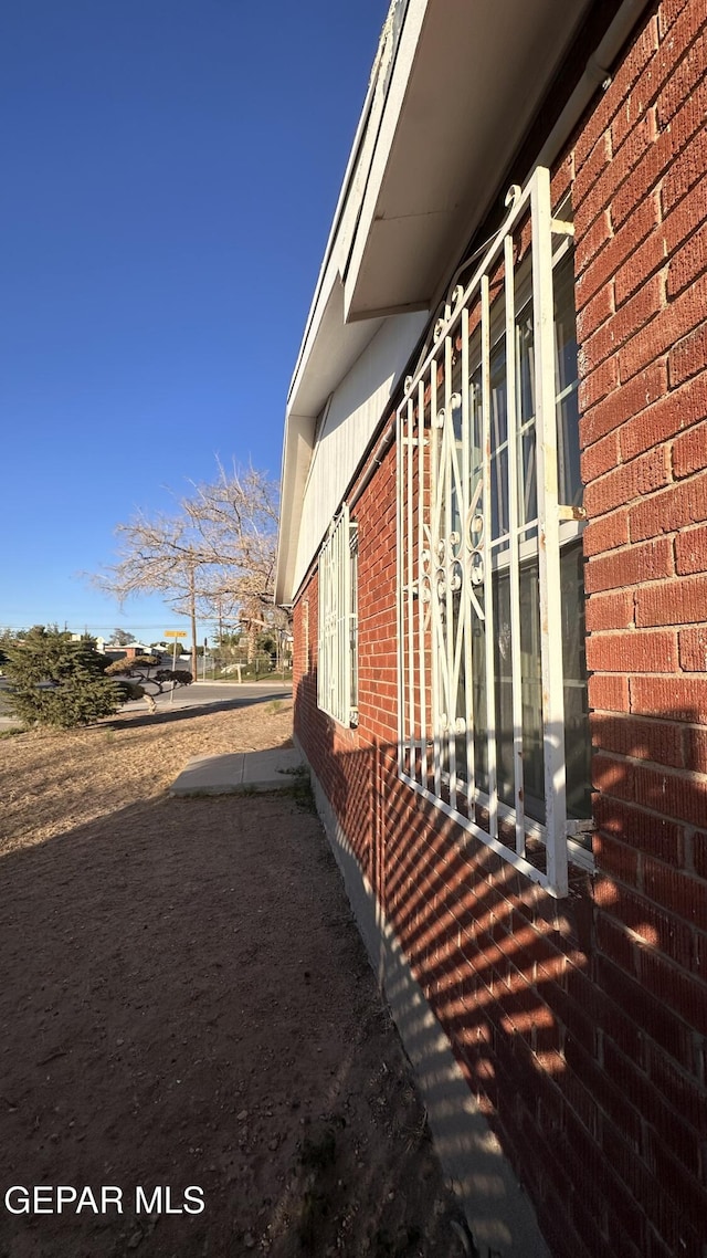 1117 Zuni Pl, El Paso, TX 79925 - view of side of home featuring brick siding