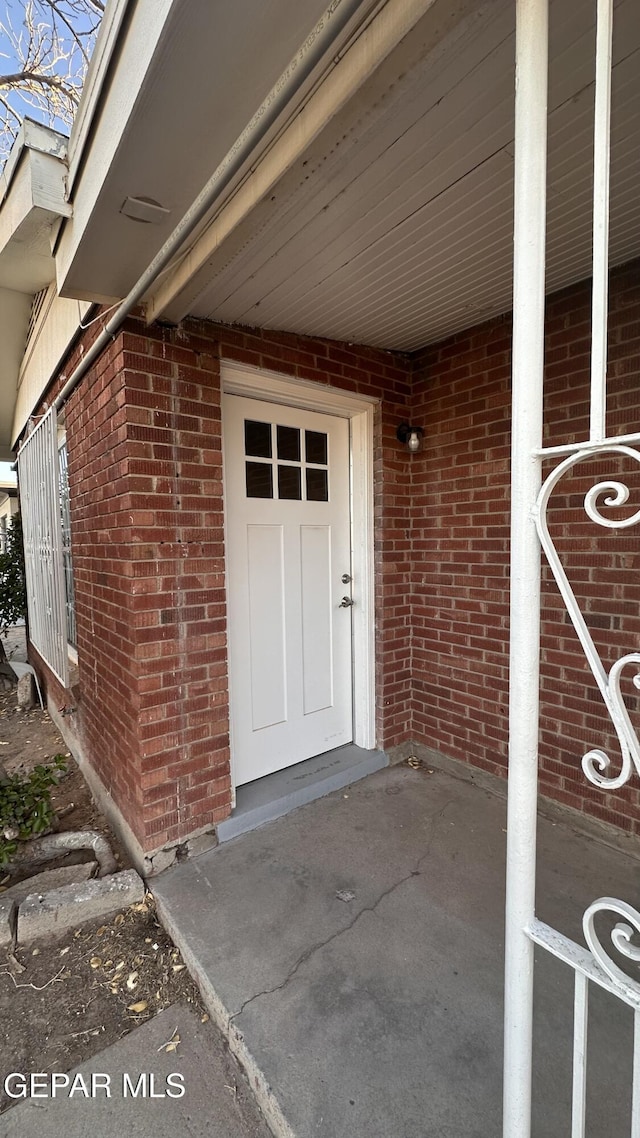 1117 Zuni Pl, El Paso, TX 79925 - doorway to property with brick siding