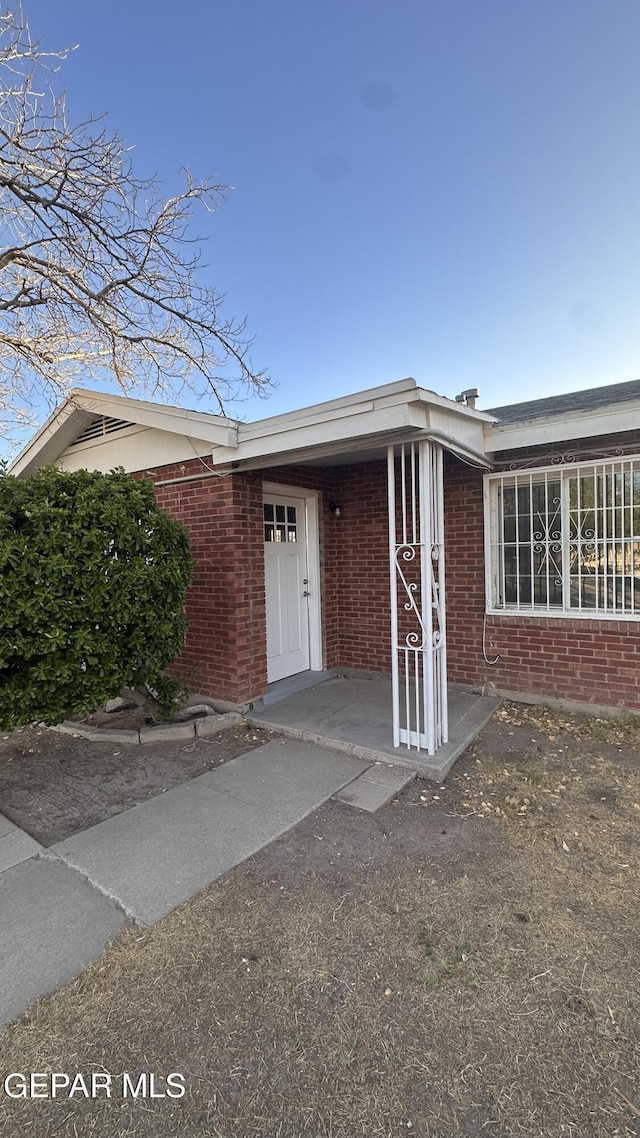 1117 Zuni Pl, El Paso, TX 79925 - doorway to property with brick siding