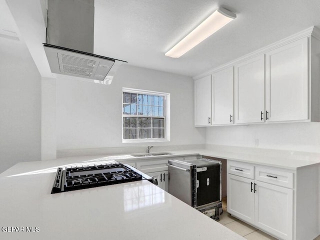 1117 Zuni Pl, El Paso, TX 79925 - kitchen with white cabinetry, a sink, light countertops, range hood, and light tile patterned floors