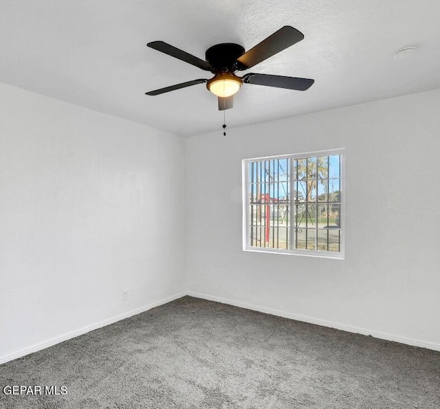1117 Zuni Pl, El Paso, TX 79925 - empty room with carpet flooring, a ceiling fan, and baseboards