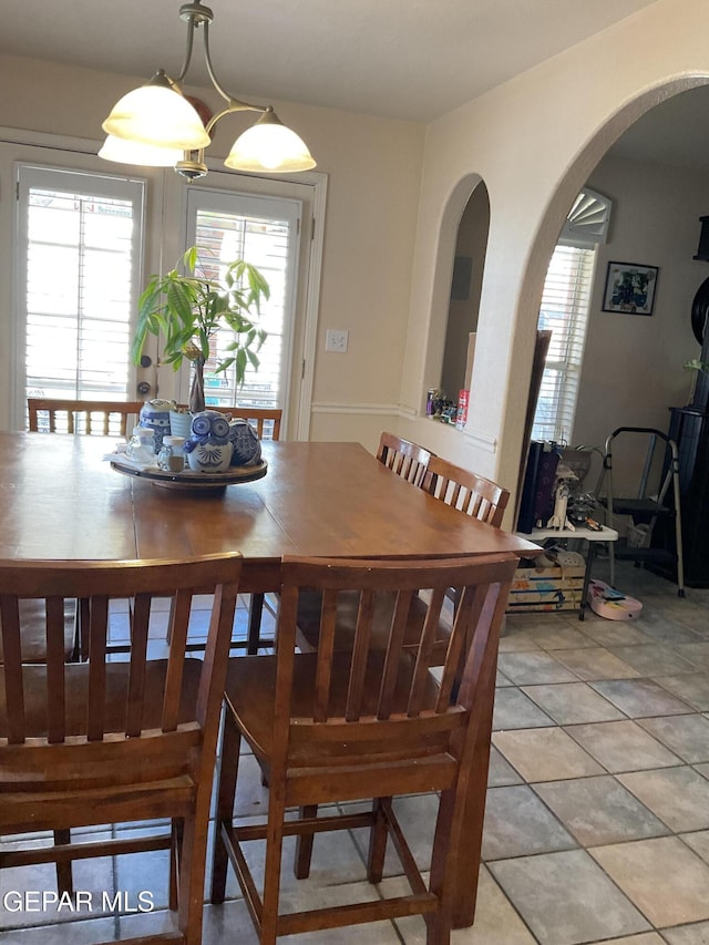1360 Luz Carpio Way, El Paso, TX 79936 - dining space with arched walkways