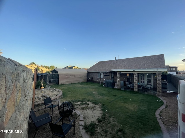 1360 Luz Carpio Way, El Paso, TX 79936 - view of yard with an outdoor fire pit and a patio area