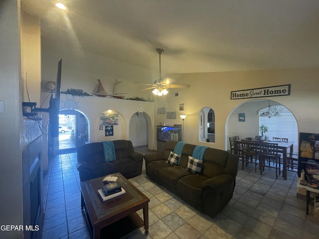 1360 Luz Carpio Way, El Paso, TX 79936 - living area featuring ceiling fan, plenty of natural light, arched walkways, and lofted ceiling