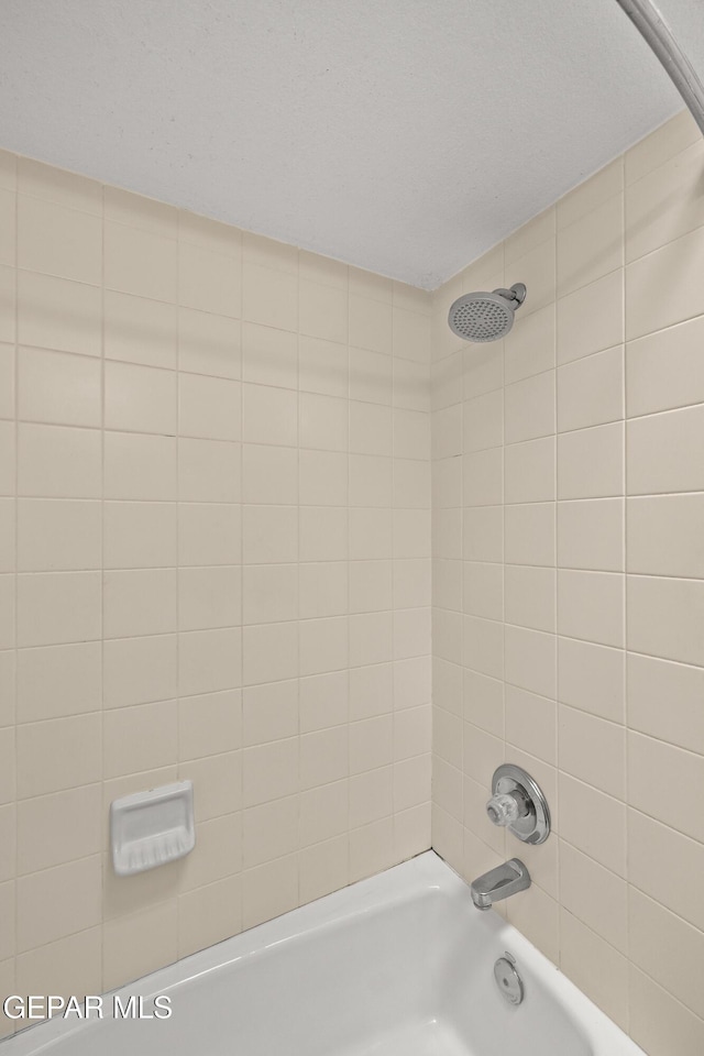 6637 Wind Ridge Dr, El Paso, TX 79912 - bathroom featuring shower / tub combination