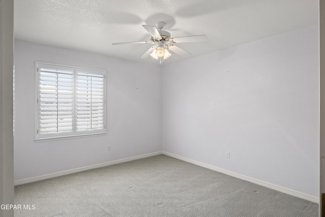6637 Wind Ridge Dr, El Paso, TX 79912 - carpeted spare room featuring ceiling fan and baseboards