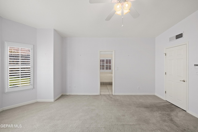 6637 Wind Ridge Dr, El Paso, TX 79912 - spare room featuring light carpet and ceiling fan