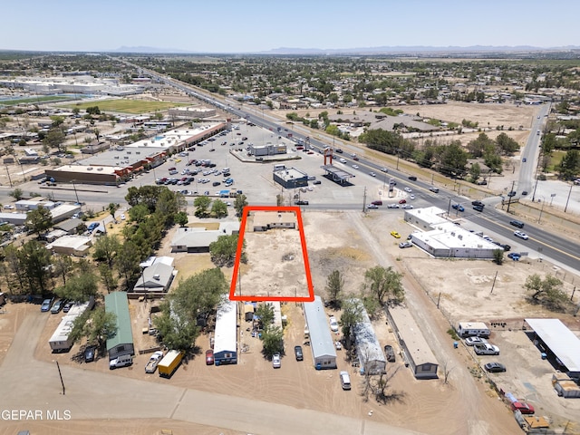 113 N Moon Rd, Socorro, TX 79927 - aerial view of property's location featuring property boundaries highlighted and a mountain backdrop