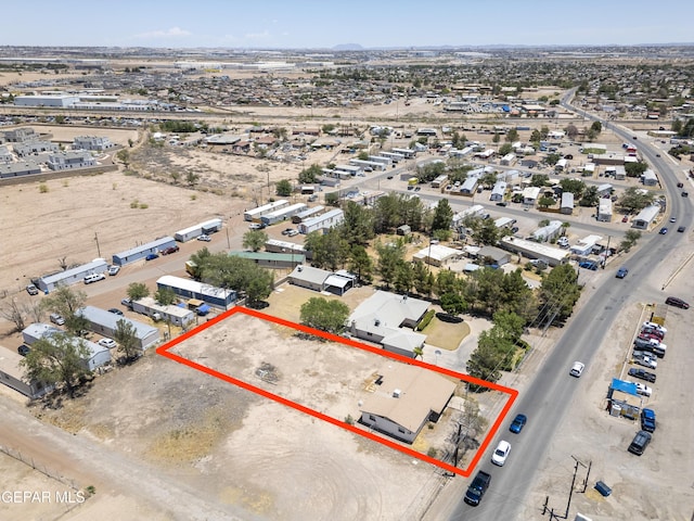 113 N Moon Rd, Socorro, TX 79927 - aerial view of property and surrounding area featuring property parcel outlined and a mountain backdrop