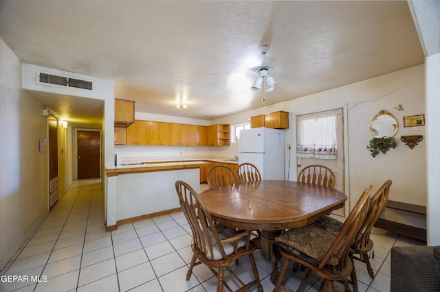 113 N Moon Rd, Socorro, TX 79927 - dining room featuring light tile patterned floors and a ceiling fan