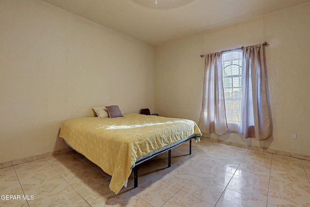 6112 Strahan Rd, El Paso, TX 79932 - bedroom featuring light tile patterned flooring