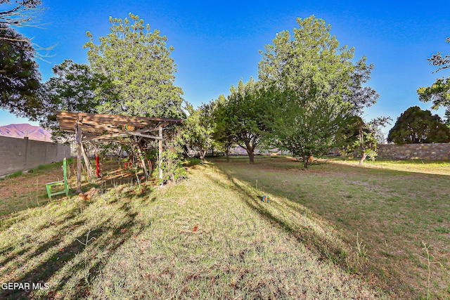 6112 Strahan Rd, El Paso, TX 79932 - view of yard featuring a pergola