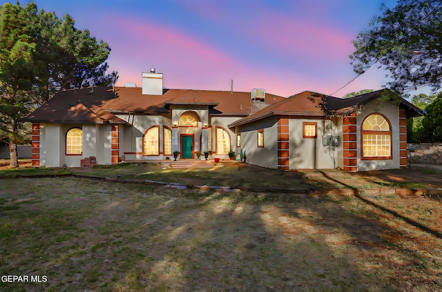 6112 Strahan Rd, El Paso, TX 79932 - mediterranean / spanish house with a chimney and stucco siding