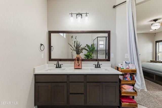 14689 Pebble Hills Blvd, El Paso, TX 79938 - bathroom featuring double vanity and ensuite bath