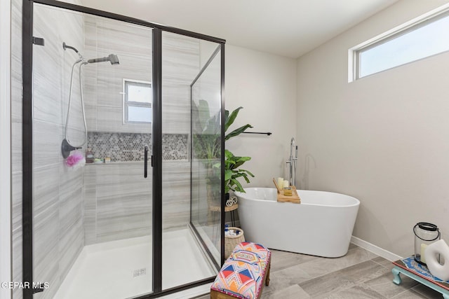 14689 Pebble Hills Blvd, El Paso, TX 79938 - full bathroom with a shower stall and a soaking tub