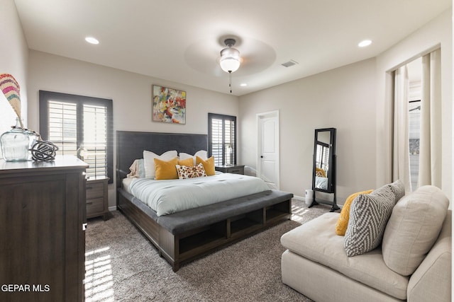 14689 Pebble Hills Blvd, El Paso, TX 79938 - bedroom with light carpet, multiple windows, recessed lighting, and a ceiling fan